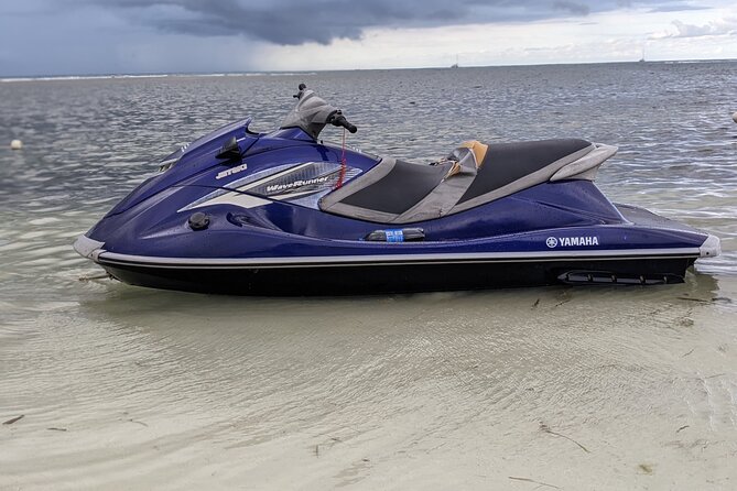 Parasailing, Sea Tubing & Jet Ski from Montego Bay- Private tour - Back on the beach: switching from parasail calm to jet ski speed