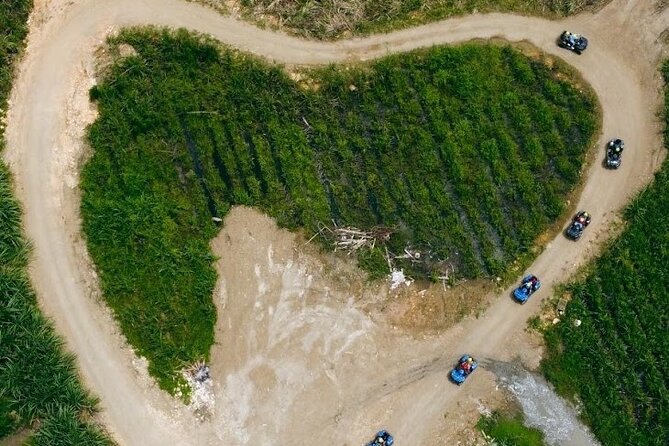 Private ATV Ride 7 Mile Beach & Rick’s Café Negril Tour - Tryall Golf Course: a quick stop with a long story feel