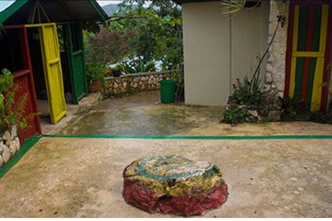 Private Bob Marley 9 mile & DunnsRiverFalls Tour from Montego Bay - Dunn’s River Falls in Ocho Rios: terraced steps, guided climbing, and a needed cool down