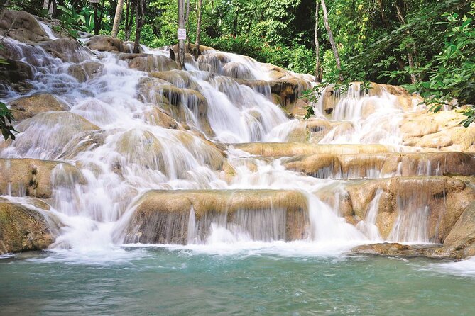 Private Dunn's River Falls Jamaica - Dunn’s River Falls drops into the Caribbean, and that changes the whole feel