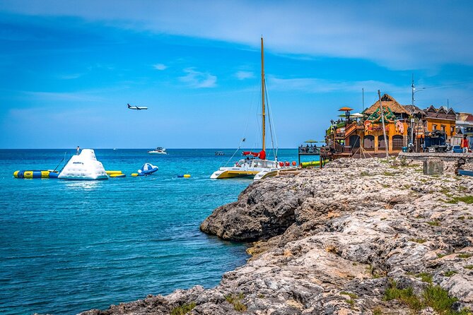 Private Montego Bay Highlights Tour with Pickup Included - Inner city community views: seeing real life between big sights