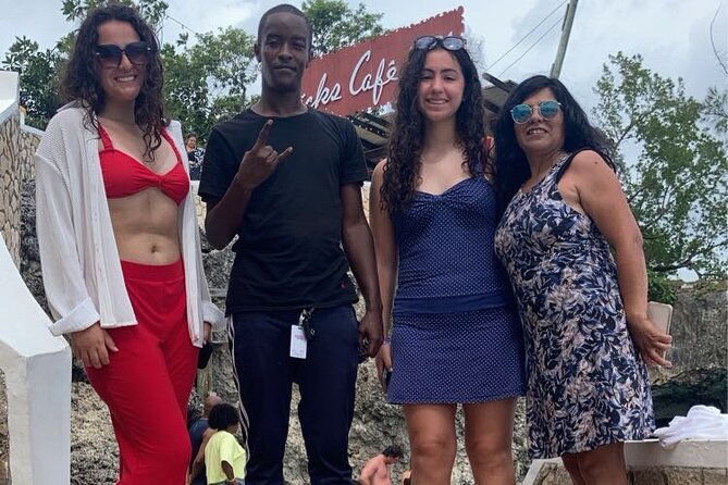 Private Negril 7 Mile Beach and Rick's Cafe Tour from Montego Bay - Seven Mile Beach for relaxing, swimming, and choose-your-own-adventure watersports