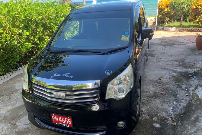 Private Roundtrip Airport Transfer Negril Hotels - The Ride Itself: A/C, Water, Wi-Fi, and Your Music