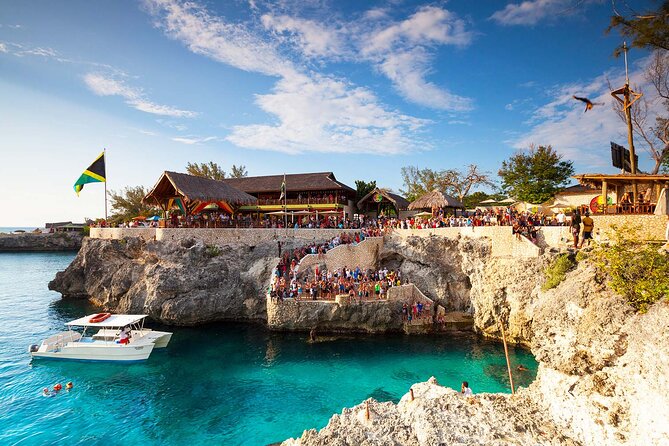 Private Trip to Blue Hole Mineral Springs, Negril & Ricks Café - Negril and Margaritaville: Beach Time Plus Craft Market Browsing