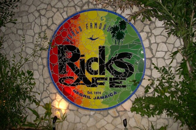 Private Trip to Blue Hole Mineral Springs, Negril & Ricks Café - Rick’s Cafe Sunset: Cliff Divers, Reggae, and Your Last Big View