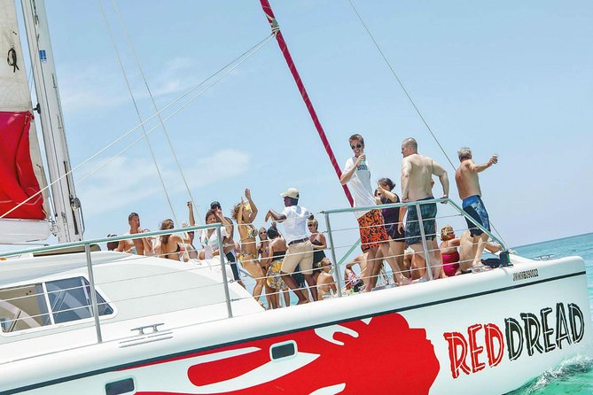 Reggae Catamaran and Snorkeling Open Bar Cruise Montego Bay - A party catamaran cruise with snorkeling, not a quiet beach day