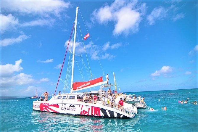 Reggae Catamaran and Snorkeling Open Bar Cruise Montego Bay - Doctor’s Cave Beach snorkeling: the reef stop that sets up the bar