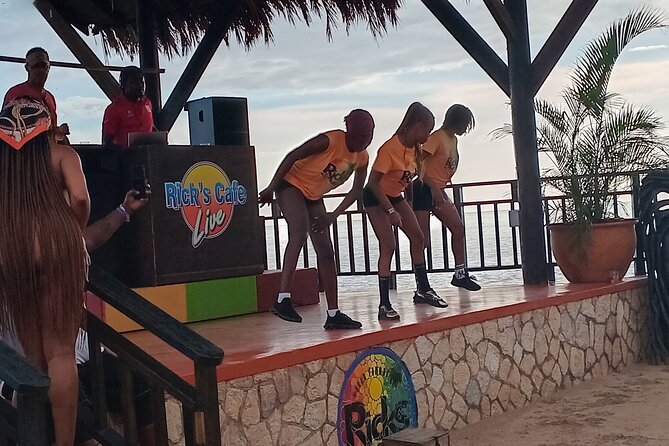 Seven Miles Beach in Negril and Ricks Cafe from Montego Bay - Rick’s Café at sunset, DJ music, food views, and the 30-foot cliff jump