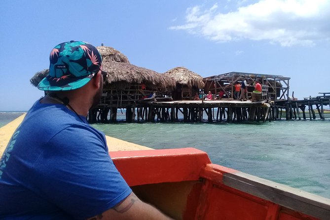 YS Falls & Pelican Bar Tour - Stop 2: Floyd’s Pelican Bar, stilts, sea air, and mixed vibes