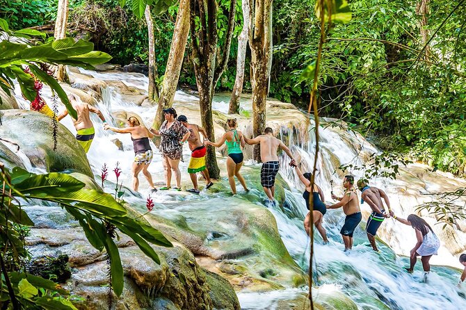 Zipline, Dunn’s River Falls, Bamboo Rafting & Horseback Ride Tour - Zipline over waterfalls: the rush with real views